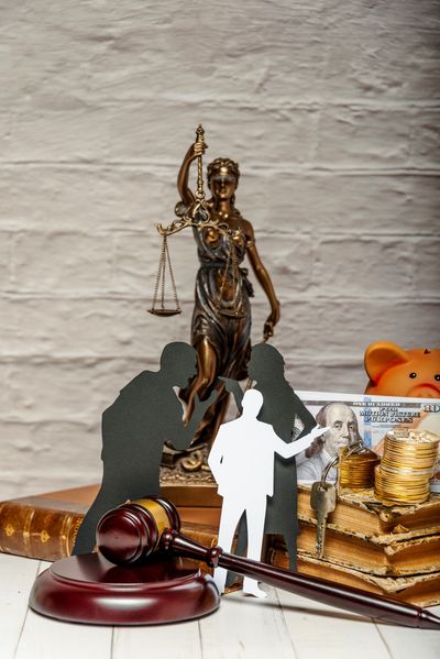Lady Justice statue with gavel.