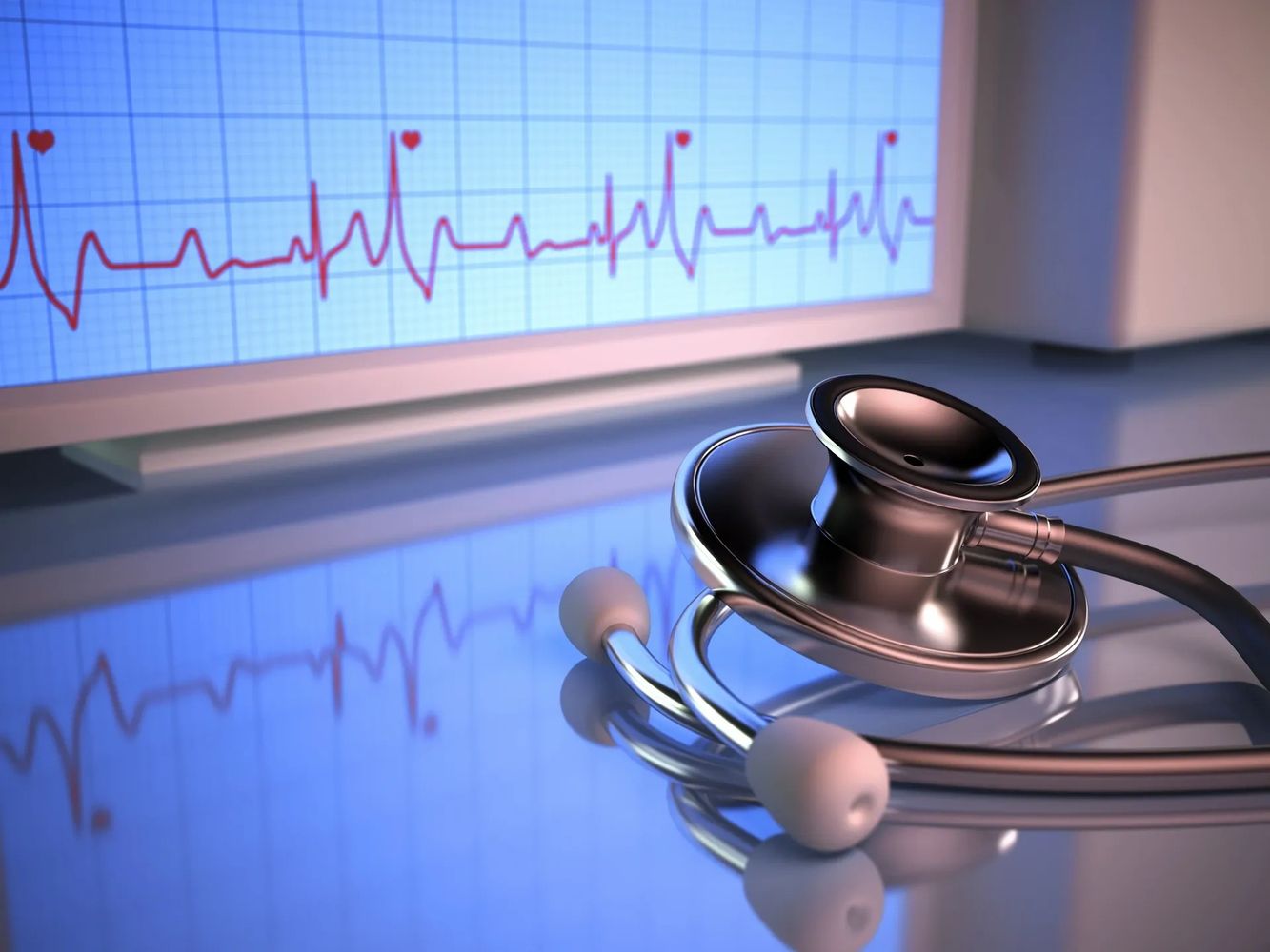 Stethoscope with heart rate monitor displaying a heartbeat graph.