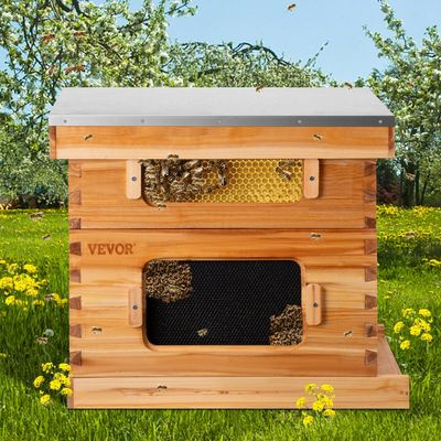 Wooden beehive box sitting in a grassy field.