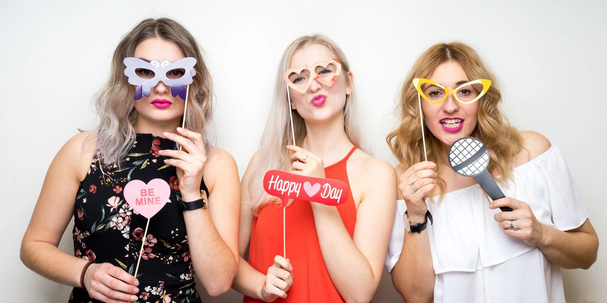 Group of people having fun in a Maine Photo Booth from Big Time Entertainment