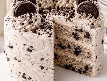 velvety cake layered with creamy cookies-and-cream frosting and topped with chocolate cookie crumbs.