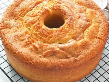 A freshly baked golden-brown chiffon cake.