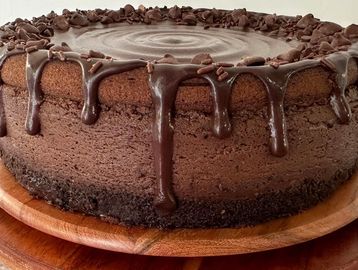 Chocolate cake with ganache and chocolate chips.