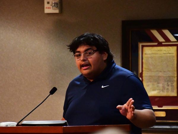 Juan Speaking at (Federal Way) City Council. 
Photo taken by Bruce Honda