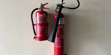 A picture showcasing fire extinguishers, serving as a reminder of the importance of fire preparedness