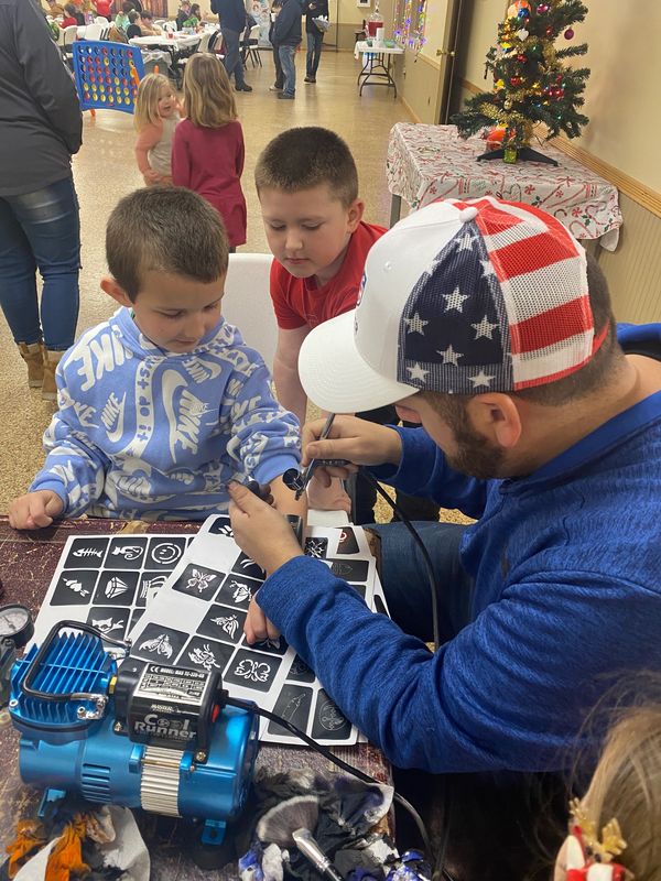 Air brush at Petrolia FD. Christmas party