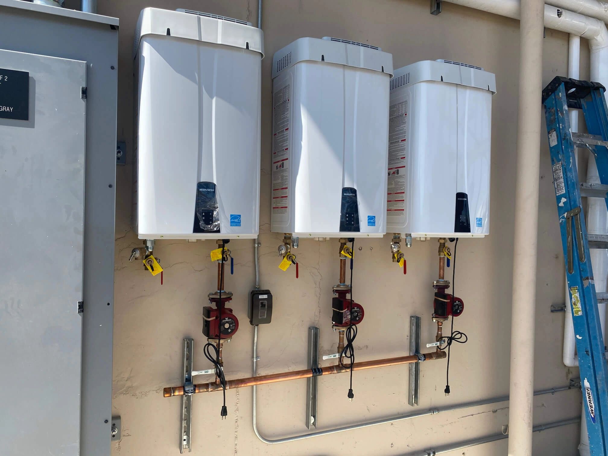 Picture of commercial plumbing pipes installed in a restaurant.