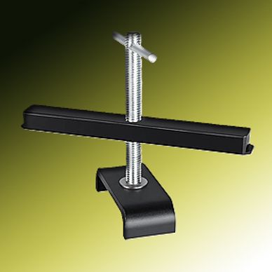 A metal clamp with a screw mechanism on a yellow background.