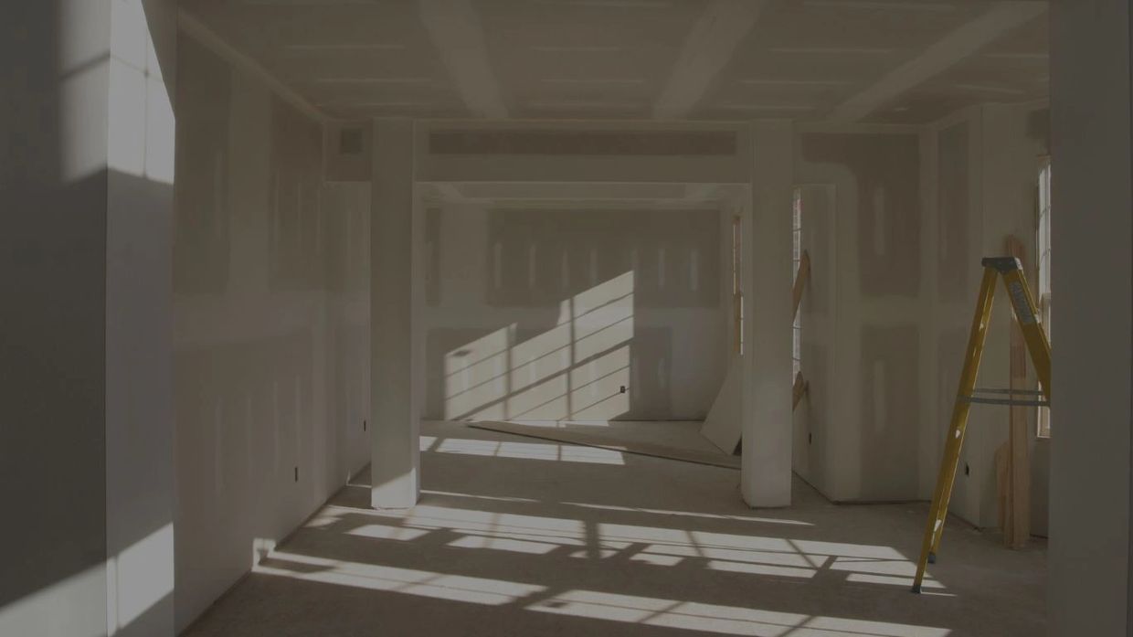 Drywall repair and smooth finish in Dallas Texas living room remodel