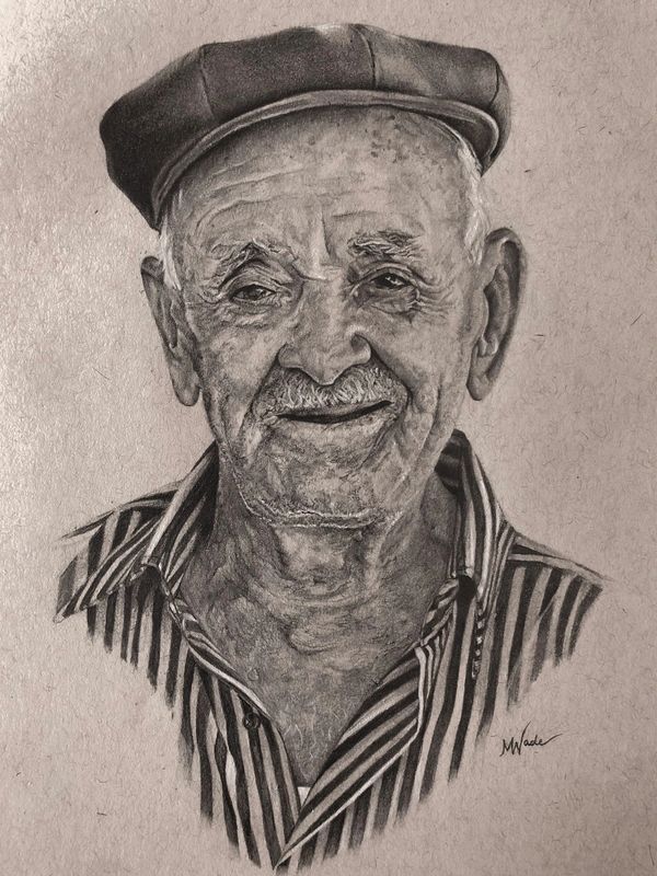 greek man with fisherman hat drawing