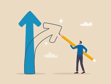 Man drawing an upward arrow with a pencil.