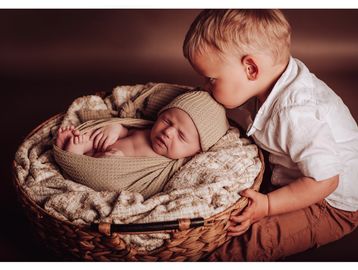 Babybauch und Newborn Fotografie