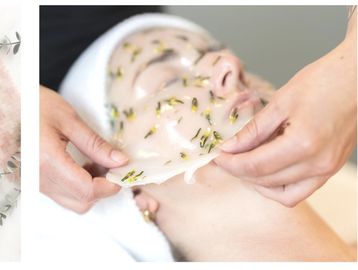 Person receiving a floral sheet mask facial treatment in a spa.