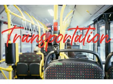 Interior view of a public bus with empty seats.