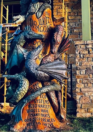 Unity Dragons chainsaw carving 