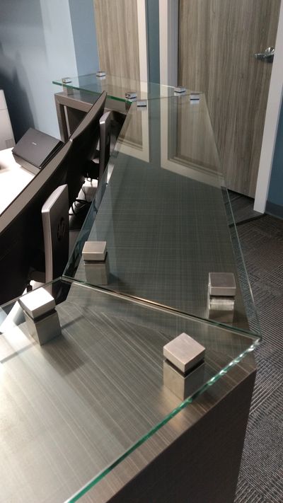 Reception Desk, custom millwork design, glass counter standoffs
