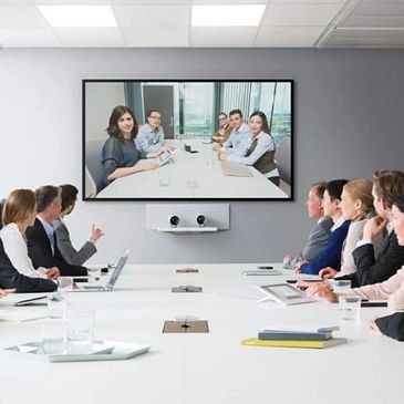 Video conferencing room installation for group meetings using the latest conference software.