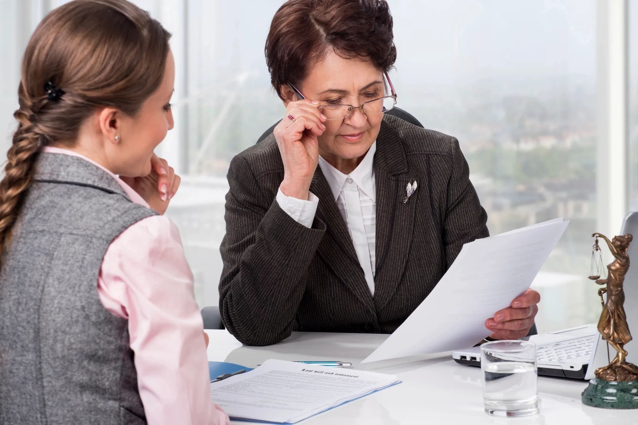 Criminal defence lawyer discussing case with client