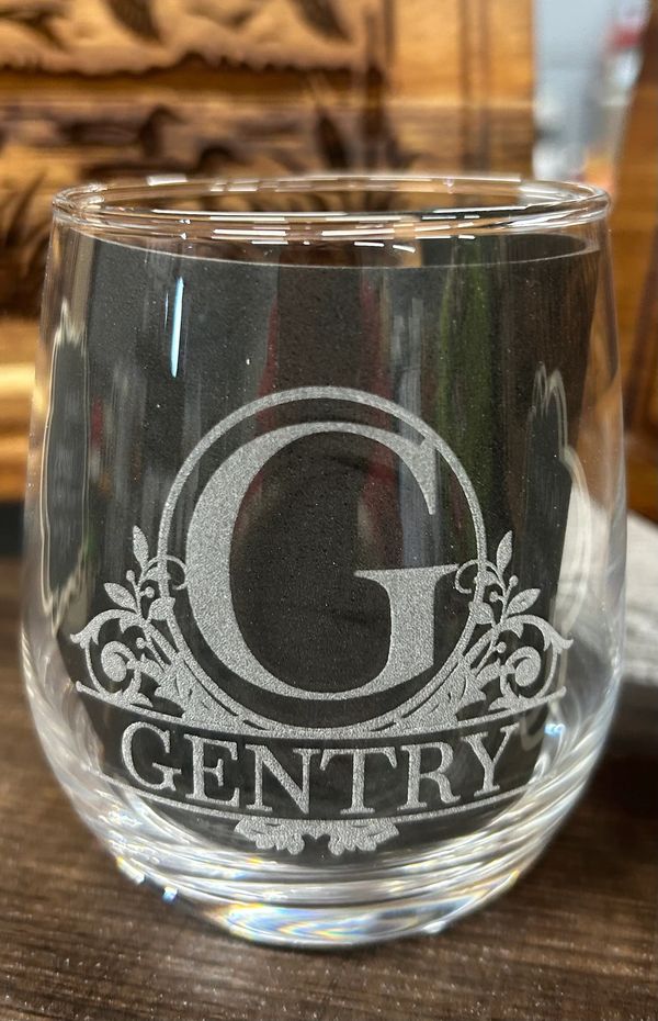 Clear glass with the etched letter 'G' and the word 'GENTRY'.