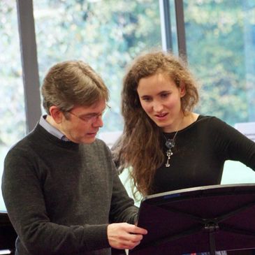 Eugene Asti coaching a student on diction