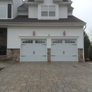 Stamped carriage house garage door
