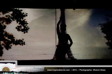 Silhouette of a person against a dramatic sky.