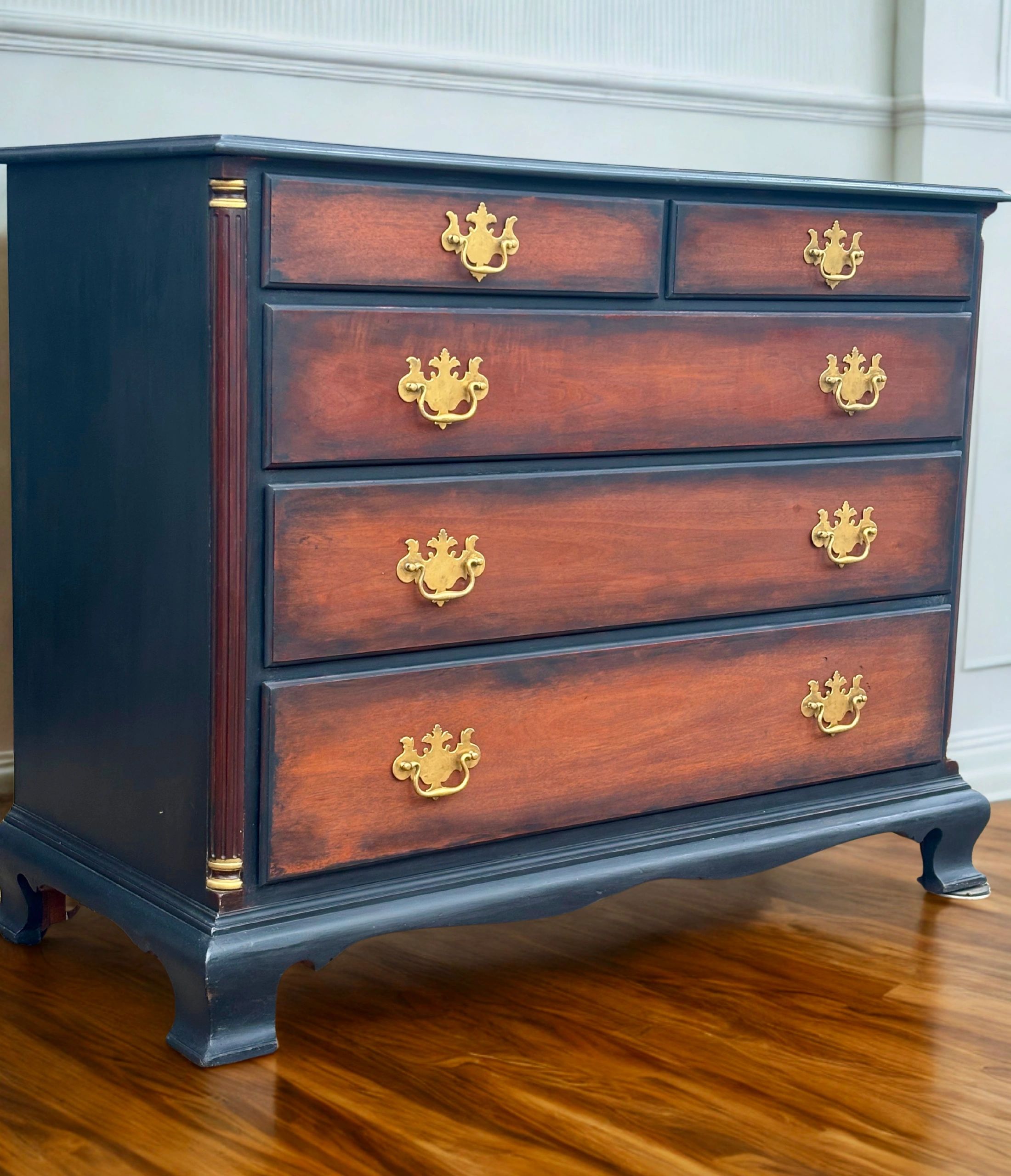 Refinish of 100 year old dresser using paint, stain, and black wax.