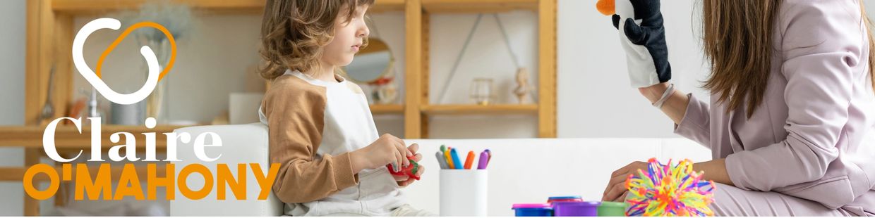 Therapist using puppet in play session