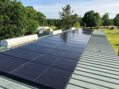 Solar panels in the country, solar panels on barn, solar panels Oklahoma outside the city 