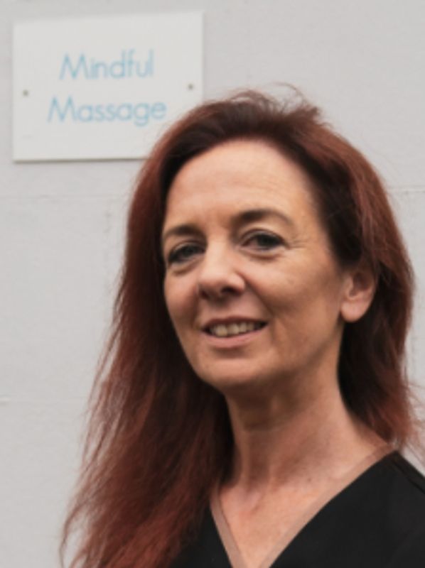 Jude Cree - Business Owner Mindful Massage outside Mindful Massage salon Holywood