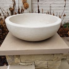 Custom carved limestone urn