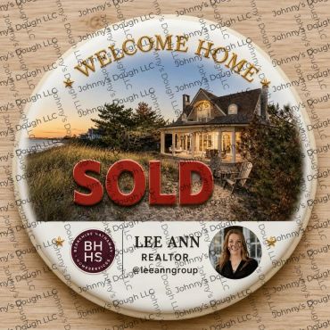 Welcome home sign with sold house and realtor info.