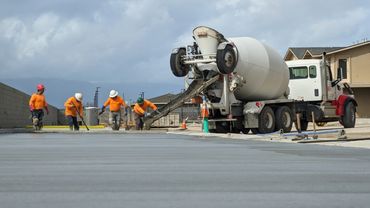 Men finishing concrete.