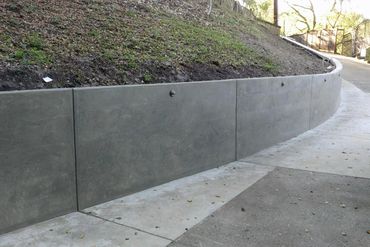 Concrete retaining wall.