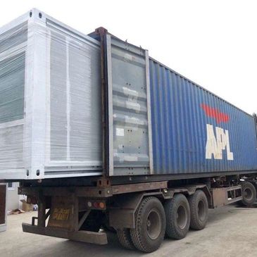 Two 20' tiny homes arrive nested in a 40' shipping container, ready to set up!