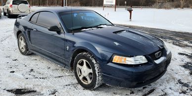 2001 Ford Mustang V6 for sale stick shift rear wheel drive for sale at lux car 1040 Dundee Ave 