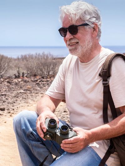 Man hiking in the Arizona desert showing reflection, strength, and healing through trauma therapy.