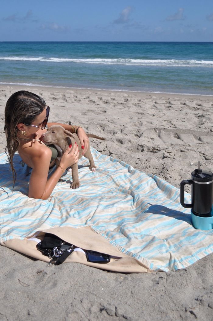 beach blanket 360 in use at the beach