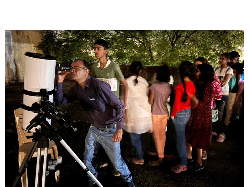 Telescope observation session under the night sky