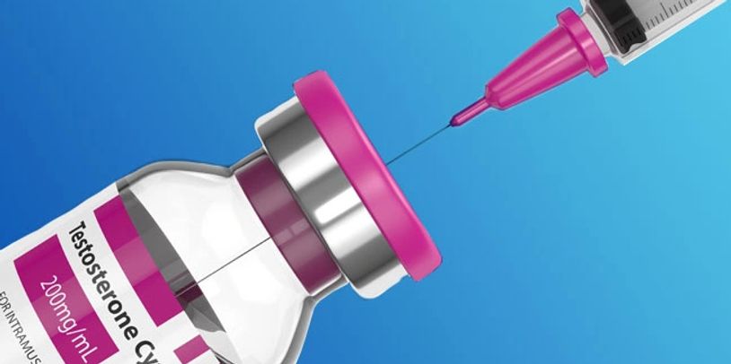 Vial of testosterone with a needle inserting  