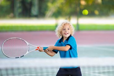 Kids Learning Tennis Skills