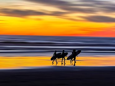 SurfersLeavingTheBeach