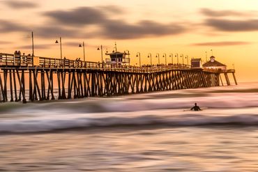 Surfer at Imperial Beach Pier