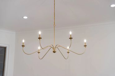 Modern chandelier with six lights.