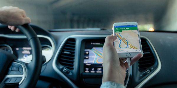Map navigation app on phone in a car