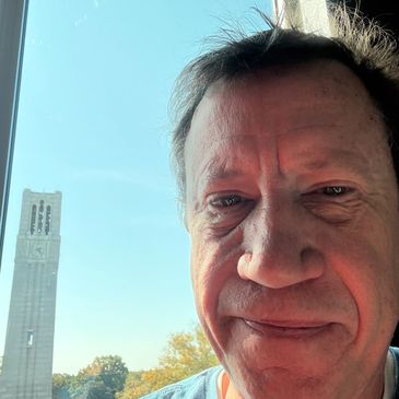 In front of the Bell Tower at NC State. Go Pack!
