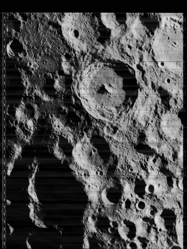 Craters on the moon's surface with horizontal distortion lines.