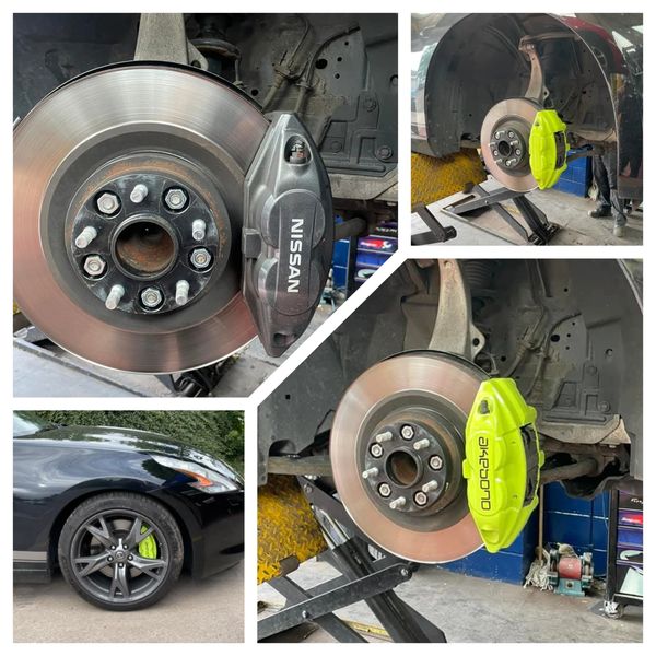 Comparison of Nissan and Akebono brake calipers on a car's wheels, including a bright green upgrade.