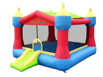 Colorful inflatable bounce house with a slide for kids.