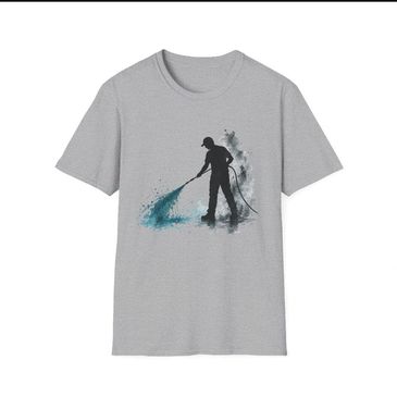 Gray t-shirt with silhouette of a person spraying water in blue and black hues.